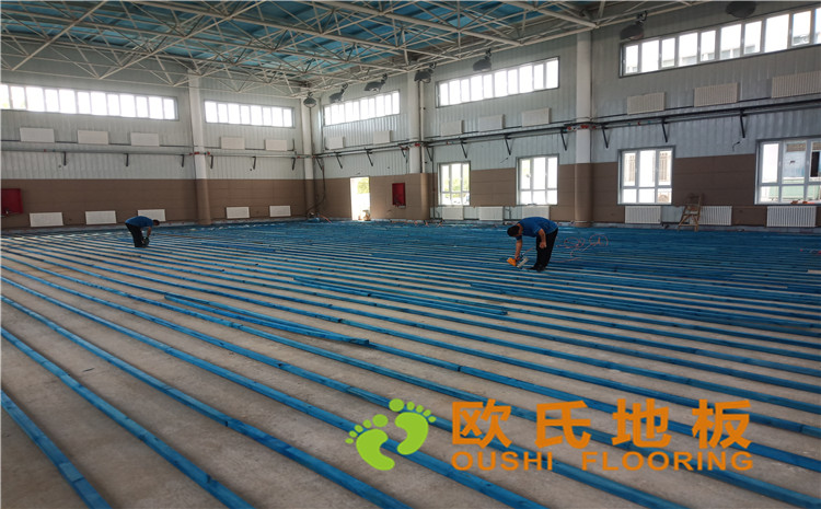 新疆克拉瑪依市獨山子虹園小區體育館木地板項目-歐氏運動木地板